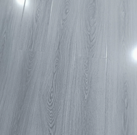 Prix de gros usine AC4 Couche d'usure 8mm 10mm 12mm Plancher stratifié en bois Design moderne pour salon