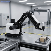 Petit robot avec ventouse pour le placement automatique de pièces sur la chaîne d'assemblage