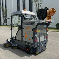 Machine de balayage extérieure avec enrouleur de tuyau automatique de 10 m et système de pulvérisation d'eau haute pression