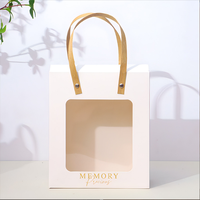 Sac cadeau en papier transparent haut de gamme de style nouveau pour cadeaux à offrir à la main, emballage cadeau pour la Saint-Valentin, anniversaire, festival