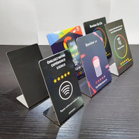 Support NFC personnalisé avec logo, code QR programmable, paiement sans contact, avis Google, menu réseaux sociaux, affichage de table, carte intelligente