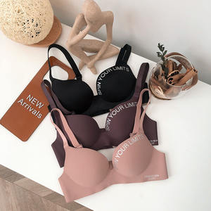 Venta al por mayor Japonés Inglés Carta Suave Transpirable Invisible Mujeres Acolchado Una Pieza Sin Costuras Inalámbrico Laser Cut Bra Mix - Product Image 2