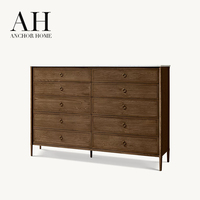 Commode de style Mid-Century en chêne massif noir avec plateau en marbre, dix tiroirs, grand rangement, poignées annulaires, pieds coniques, écologique, pour chambre à coucher