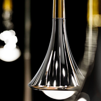 Lustre LED moderne de luxe en forme de vague, luminaire suspendu personnalisable en acier inoxydable et verre pour hall d'hôtel et villa