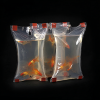 Sac en plastique transparent gonflable thermoscellable portable en stock pour le transport et l'expédition de poissons vivants et de fruits de mer