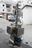 Machine semi-automatique de remplissage de mélangeur thermique de vaseline de bougie de cire machine d'embouteillage de chauffage de mélange de gelée de pétrole