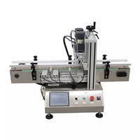 Machine de remplissage, de bouchage, d'étiquetage et d'emballage automatique de liquides à 4 têtes de haute précision (50-1000 ml) pour boissons