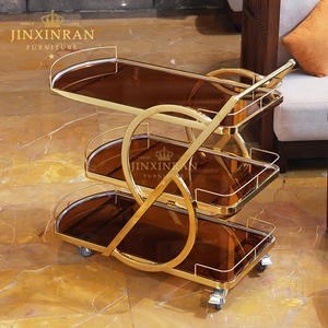 इतालवी आधुनिक लक्जरी गोल्डन स्टेनलेस स्टील रेस्तरां 3 टियर टेम्पर्ड ग्लास चाय की सेवा ट्रॉली - Product Image 1