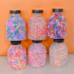 Simpatici 1000 pz/scatola per bambini usa e getta per <span class=keywords><strong>capelli</strong></span> con <span class=keywords><strong>elastici</strong></span> colorati e bottiglia di plastica per ragazze - Product Image 1