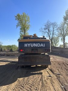Excavatrice sur pneus de haute qualité HYUNDAI 210W-9 d'occasion avec faible kilométrage et système hydraulique - Product Image 5