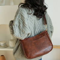 Sac bandoulière messager rétro grande capacité 2026 en cuir PU neuf avec sangle réglable pour femme