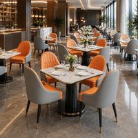 Chaise de salle à manger bicolore orange et gris, table en marbre avec piétement, mobilier de restaurant contemporain personnalisable en or pour hôtel, vente en gros