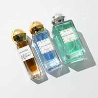 Quadratische Luxus-Parfümflasche 30ml 50ml 100ml Glasflasche Silberner Metallverschluss Individuelle Farbe Logo mit Goldkugel