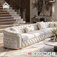 Canapé d'angle capitonné en cuir/velours blanc de luxe léger avec base plaquée or, solution d'ameublement complète pour la maison