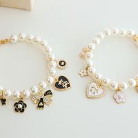 Vente en gros d'accessoires de vêtements pour animaux de compagnie Collier de perles de luxe tendance Style vintage Accessoires pour chiens et chats