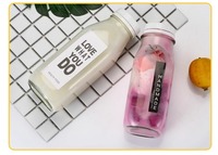 Bouteilles vides en verre de boisson de jus de fruits de lait de 16oz avec couvercles étanches