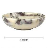 Luxe ecologische decoratieve fruitschaal van natuurlijk Calacatta Viola travertijn, gepolijst, landelijke stijl, voor noten en gedroogd fruit