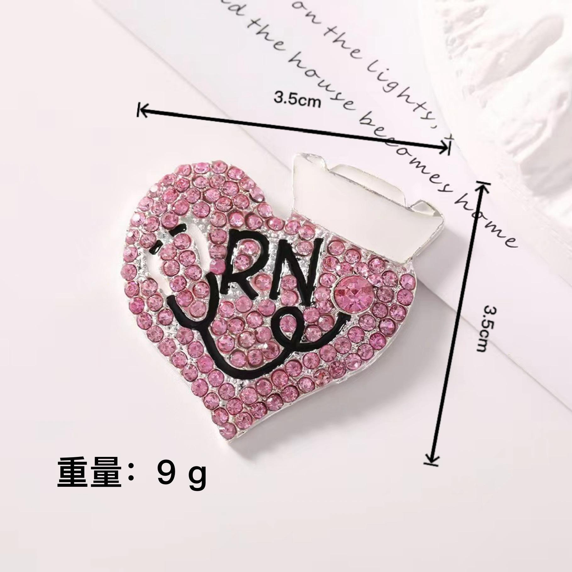 Couronne d'amour, base argentée, diamant rose.