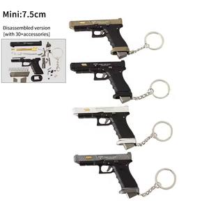 Llavero de pistola de juguete de 2.95 pulgadas con expulsión de casquillos TTi G34, llavero de metal con forma de pistola de juguete realista y económica, modelo de ensamblaje 1:<span class=keywords><strong>3</strong></span> <span class=keywords><strong>para</strong></span> serrar a mano - Product Image 1