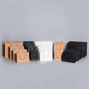 Bolsa de papel de regalo Kraft personalizada con acabado brillante Moda reciclada Maneja tu logotipo Diseño elegante y colorido para ir de compras - Product Image 2