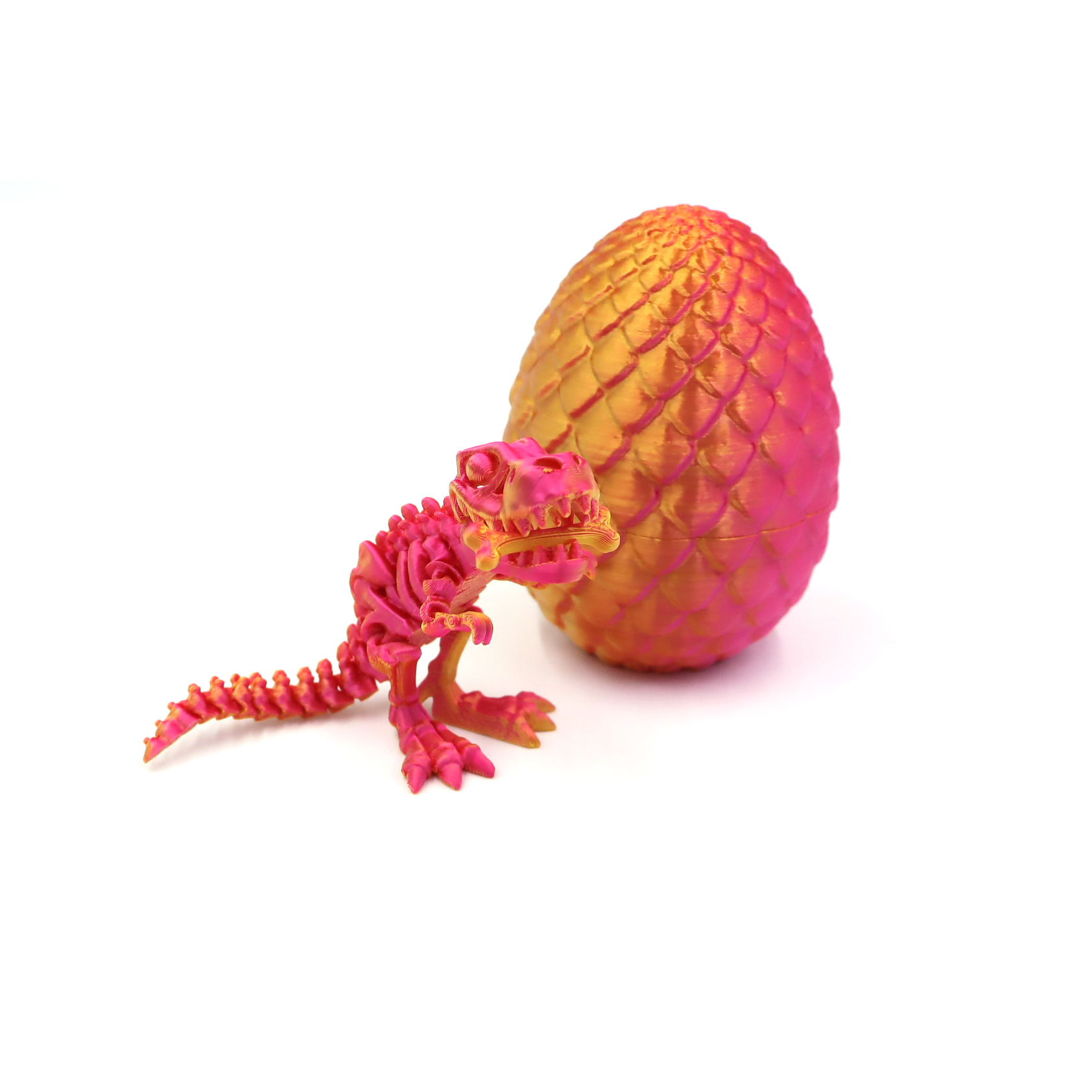 Oeuf d'ananas 8,5 cm, Dinosaure laser rouge 12,5 cm