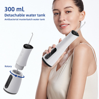 Alat Semprot Air Gigi Elektrik Mini Tanpa Kabel Plastik USB Portabel 300ml Tahan Air Warna Pink 1100mAh Kapasitas Besar Untuk Rumah Tangga Hotel RV Perjalanan