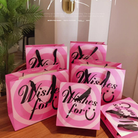 Sacs en papier personnalisés pour vêtements, emballages cadeaux, sacs de shopping de luxe, sacs en papier populaires avec votre propre logo
