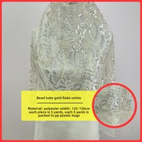 Tissu de dentelle de luxe perlé lourd tissu brodé de perles de paillettes pour robe de soirée de mariage cultivée
