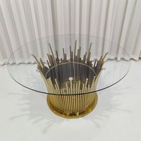Table à manger ronde avec plateau en verre transparent et base en acier inoxydable doré