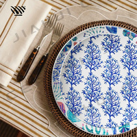 Assiettes en porcelaine Submerge in Oceanic Grace - Motifs marins enchanteurs en bleu et aux teintes colorées, compatibles lave-vaisselle et micro-ondes