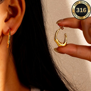 Pendientes de acero inoxidable 18k con diseño geométrico irregular y efecto hidráulico, de moda transfronteriza, de alta gama, de nicho y exagerados. - Product Image 1