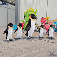 Statue d'animal animée grandeur nature véritable pingouin animatronique pour la décoration de parc animalier océanique