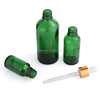 Emballage cosmétique de luxe OEM ODM, flacon compte-gouttes pour huile faciale en verre vert foncé avec impression sérigraphique
