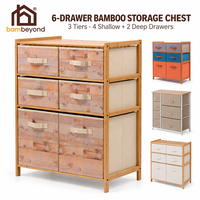 Commode de rangement moderne à 3 niveaux et 6 tiroirs en bambou durable avec tiroirs amovibles en tissu imprimé et dessus à lattes pour chambre et salon