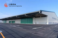 Atelier d'usine moderne en acier sur mesure, structure métallique solide, résistant au vent, à faible coût, pour garage public communautaire LIBIDA
