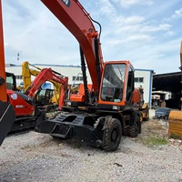 Excavadora de Ruedas Usada Doosan DX210W-9C de Segunda Mano de China, de Buena Calidad y Precio Económico, con Motor de 127kw y Brazo Probado, en Venta