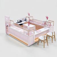Kiosque de Bijouterie Personnalisé en Or Rose avec Comptoir d'Exposition en Verre et Zone d'Expérience pour Centre Commercial de Vente au Détail