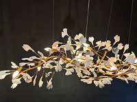 Lustre LED personnalisé, moderne et luxueux, avec décoration en feuilles de ginkgo en céramique, long luminaire suspendu pour l'éclairage de la salle à manger