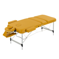 Table de massage portable moderne pliable en aluminium à 3 sections OEM, jaune, en PU imperméable, réglable en hauteur, pour spa, physiothérapie, tatouage, école