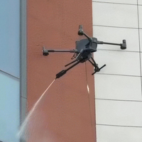 Charge utile de drone professionnel pour le nettoyage extérieur des bâtiments urbains