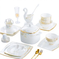 Service de table haut de gamme en porcelaine fine de Jingdezhen, compatible micro-ondes, avec bordure dorée, peint à la main, style minimaliste moderne, ensemble personnalisé