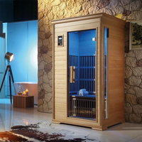 Sauna moderna de madera maciza al aire libre de cedro rojo con siete luces de colores para uso en Villa