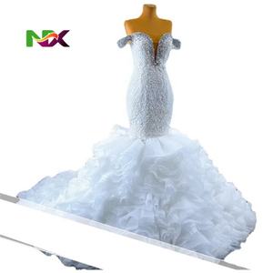 ชุดแต่งงานเจ้าหญิงทรงทรัมเป็ตแบบสั่งตัดพิเศษ ดีไซน์เกาะอก แต่งลูกไม้ผูกด้านหลัง ประดับลูกปัดและเลื่อมระยิบระยับ พร้อมระบายหรูหรา - Product Image 5