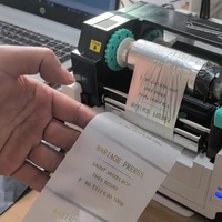 Papier d'étiquettes autocollantes transparentes en PET pour imprimante à code-barres, résistant à la déchirure, pour l'emballage cosmétique, autocollant de scellage avec bordure noire