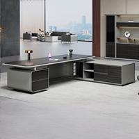 Bureau de direction en forme de L luxueux et haut de gamme, style moderne, avec éclairage LED, adapté aux bureaux haut de gamme.