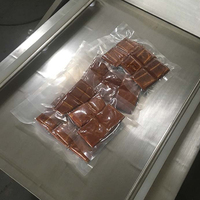 Film industriel Emballeur de tofu Emballage de grain de porc Scellant de thé Machine d'emballage sous vide avec type froid
