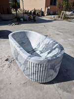 Baignoire autoportante ovale en marbre naturel – Luxueuse baignoire moderne pour salle de bain intérieure