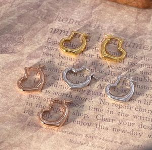 Aretes de Aro Xinfly de Oro de 18K con Forma de Corazón, Lindos y Elegantes para Uso Diario, en Oro Amarillo, Blanco y Rosa - Product Image 1