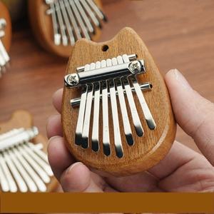 Kalimba 8 tons de haute qualité, mini piano à pouce portable, instrument de musique de niche, jouet éducatif - Product Image 2