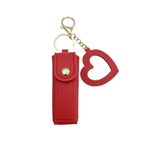 Étui à rouge à lèvres portable tendance avec miroir, porte-clés et pendentif mignon en cuir pour femme